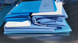 DISPOSABLE CLOTHING SET